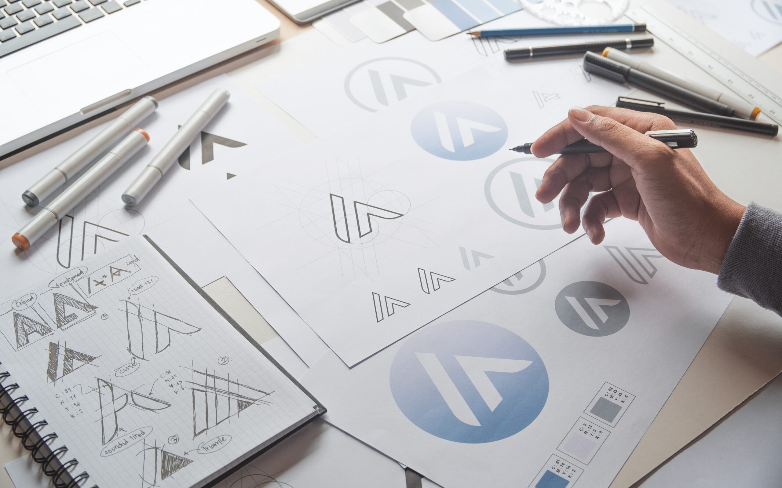 Artist creating logo drafts